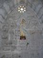 Hornacina funeraria con la imagen de la Virgen de Lourdes (s. XX)
